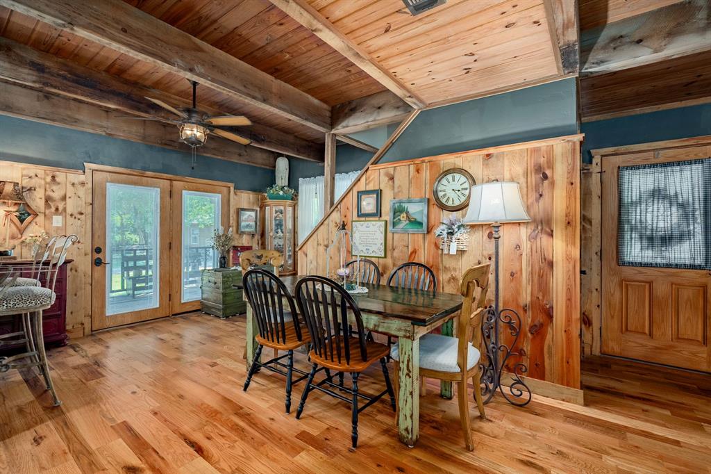 14392 Highway 78 Blue Ridge, TX 75424 - Photo 13 of 40 a dining room with wooden floor table and chairs