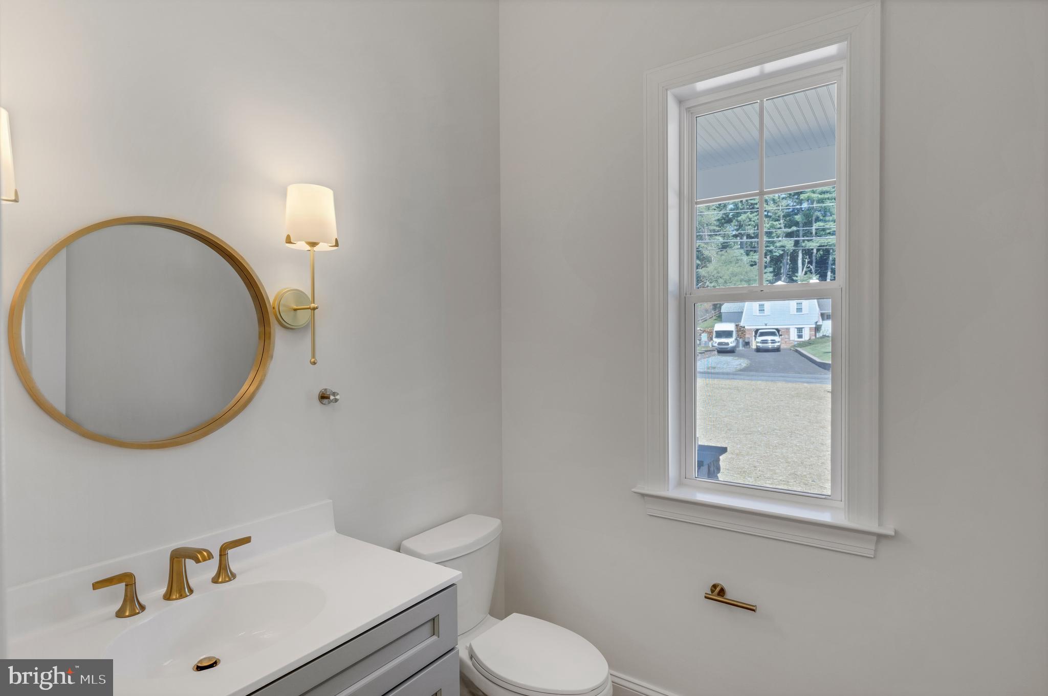 736 Northbrook Road, Unit S4 Kennett Square, PA 19348 - Photo 13 of 45 a bathroom with a sink and a mirror