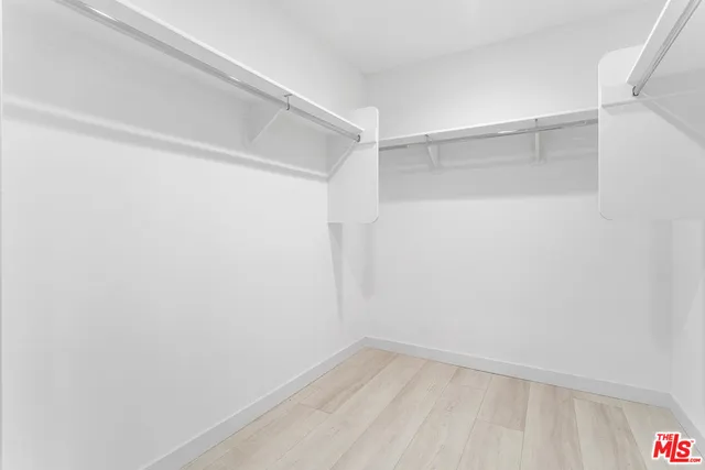 a view of an empty walk in closet