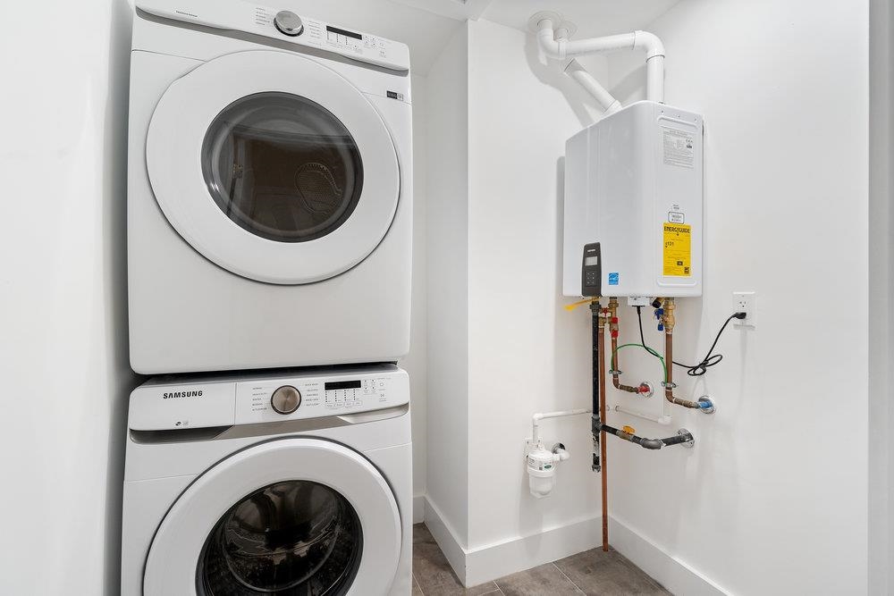 527 Union Avenue, Unit 1D Belleville, NJ 07109 - Photo 11 of 17 a view of a hallway with washer and dryer