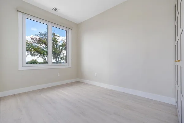 an empty room with a window