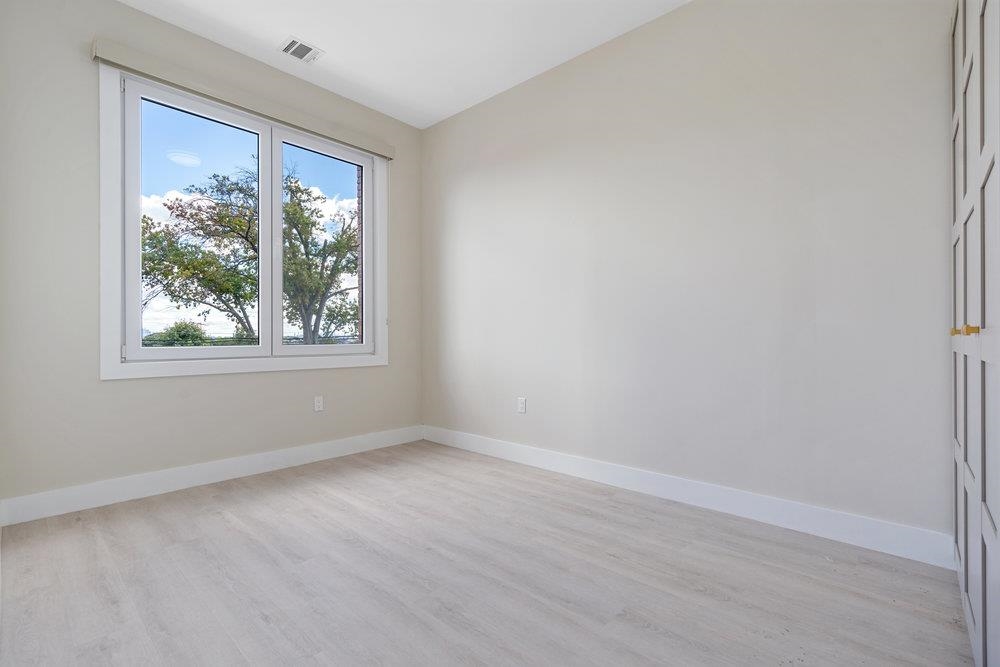 527 Union Avenue, Unit 1D Belleville, NJ 07109 - Photo 9 of 17 an empty room with a window