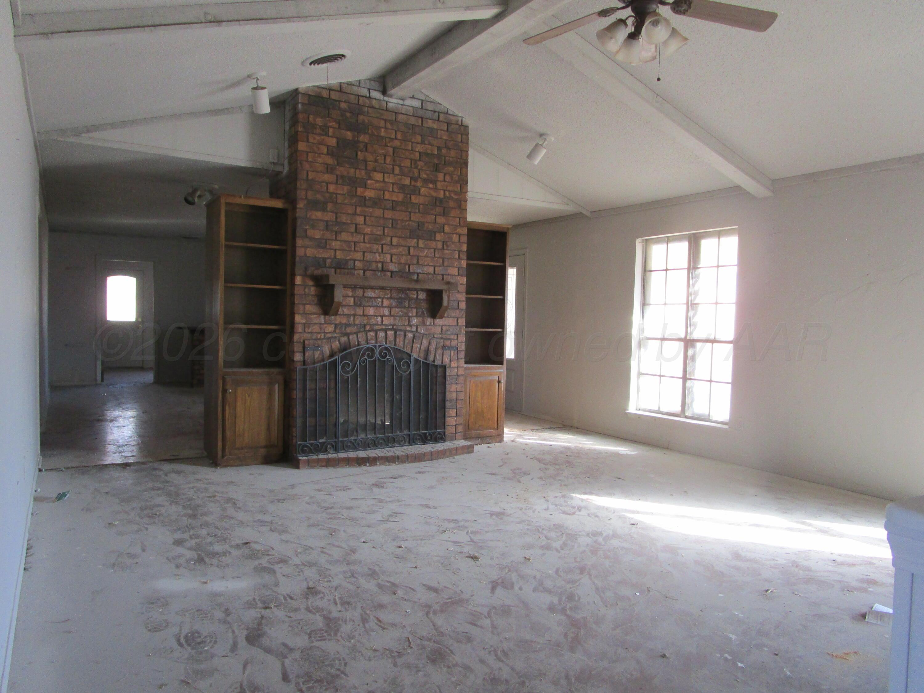 601 Alamo Street Claude, TX 79019 - Photo 17 of 30 a view of livingroom and window