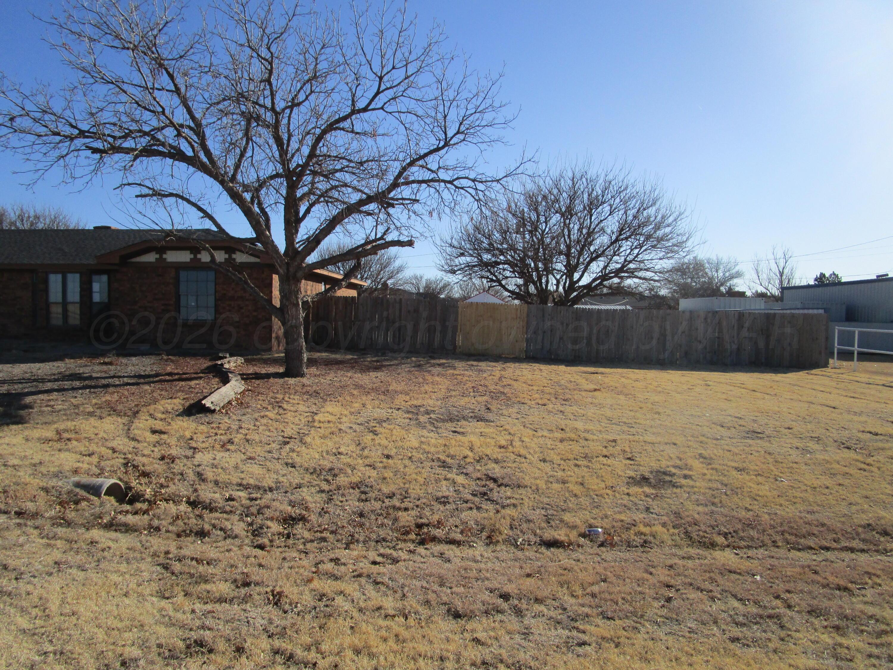 601 Alamo Street Claude, TX 79019 - Photo 29 of 30 a view of house with a yard