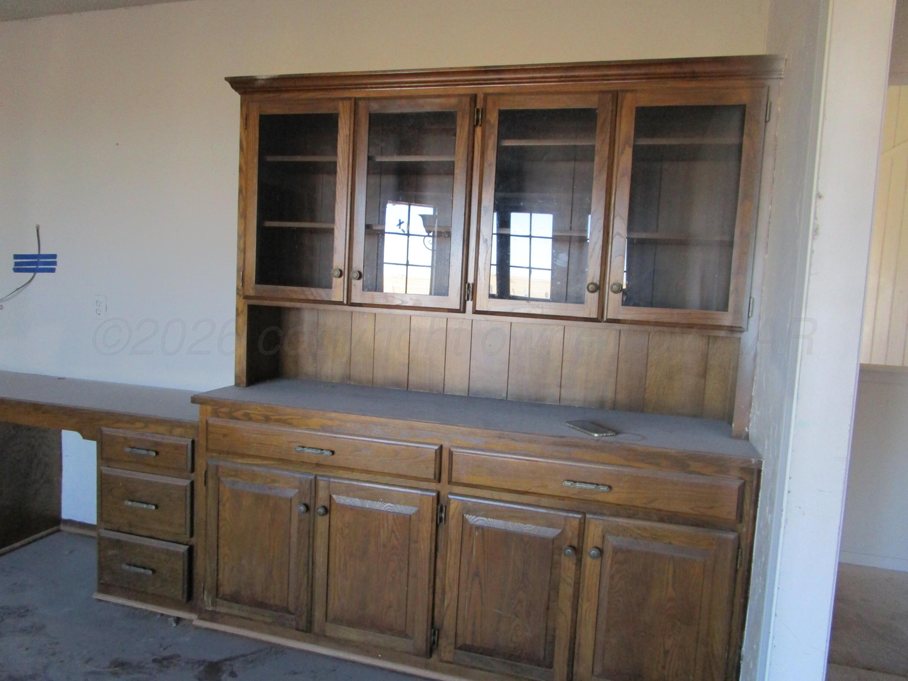 601 Alamo Street Claude, TX 79019 - Photo 5 of 30 a view of cabinets and window