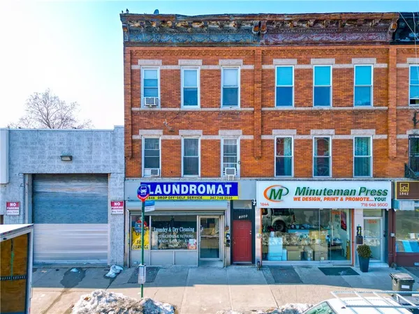 a front view of multi story residential apartment building