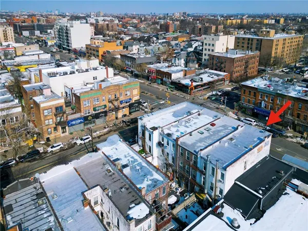 an aerial view of a city with lots of residential buildings