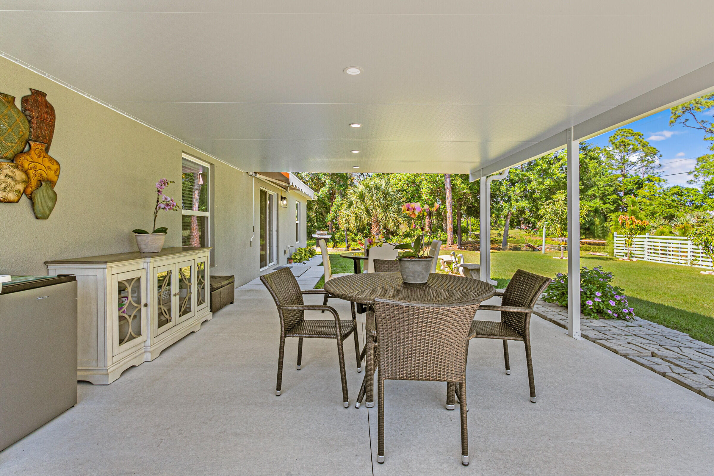 887 Fletcher Road Southeast Palm Bay, FL 32909 - Photo 24 of 41 Oversize Covered Porch