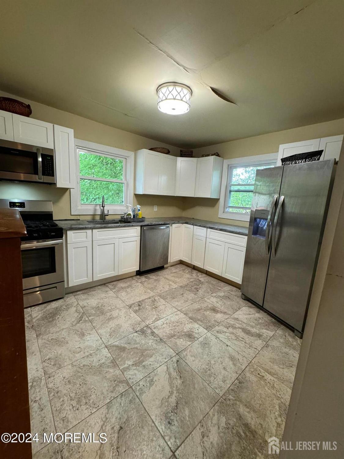 42 East 5th Street Howell, NJ 07731 - Photo 2 of 6 a large kitchen with a large window