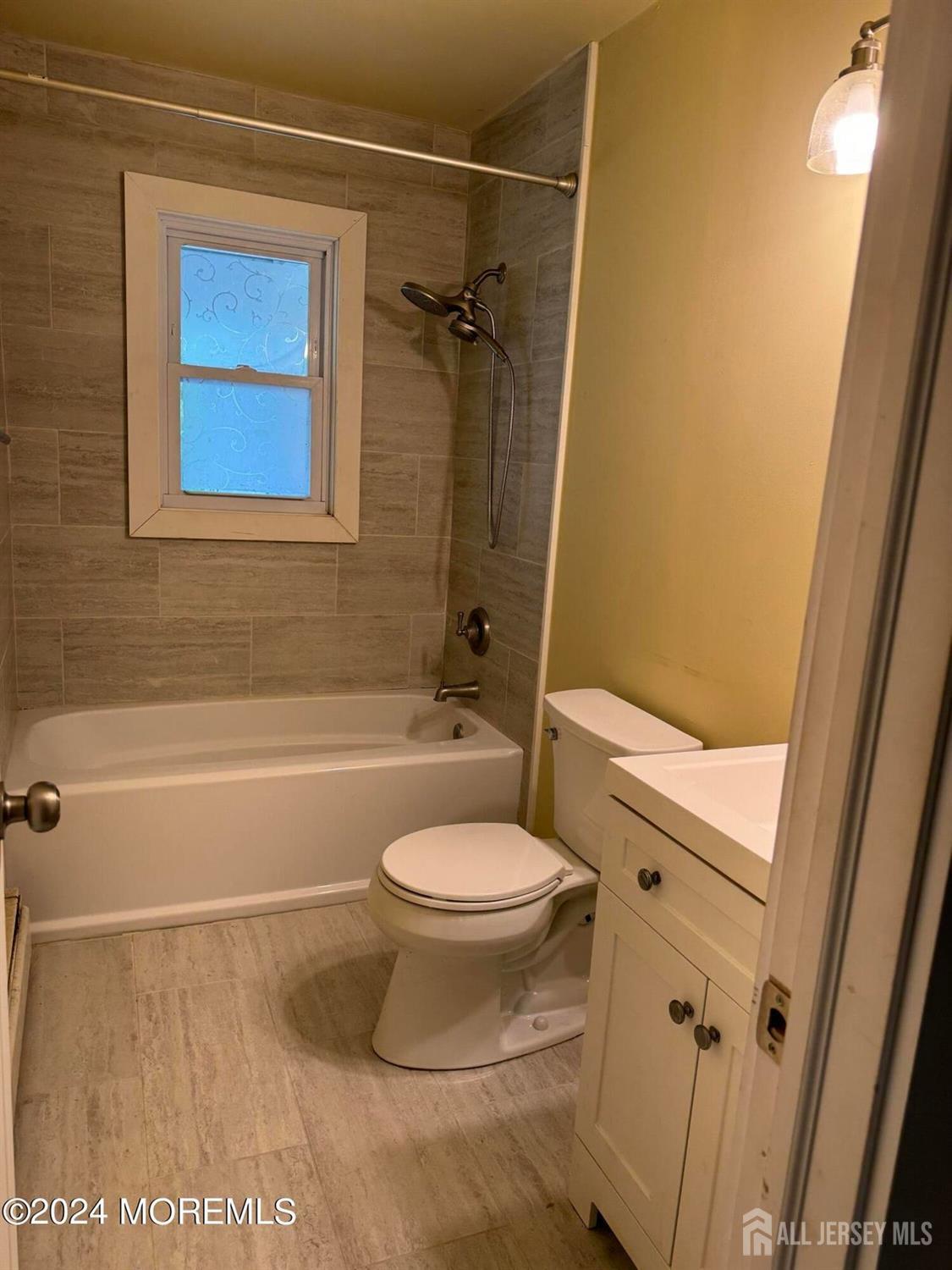 42 East 5th Street Howell, NJ 07731 - Photo 6 of 6 a bathroom with a toilet and a shower