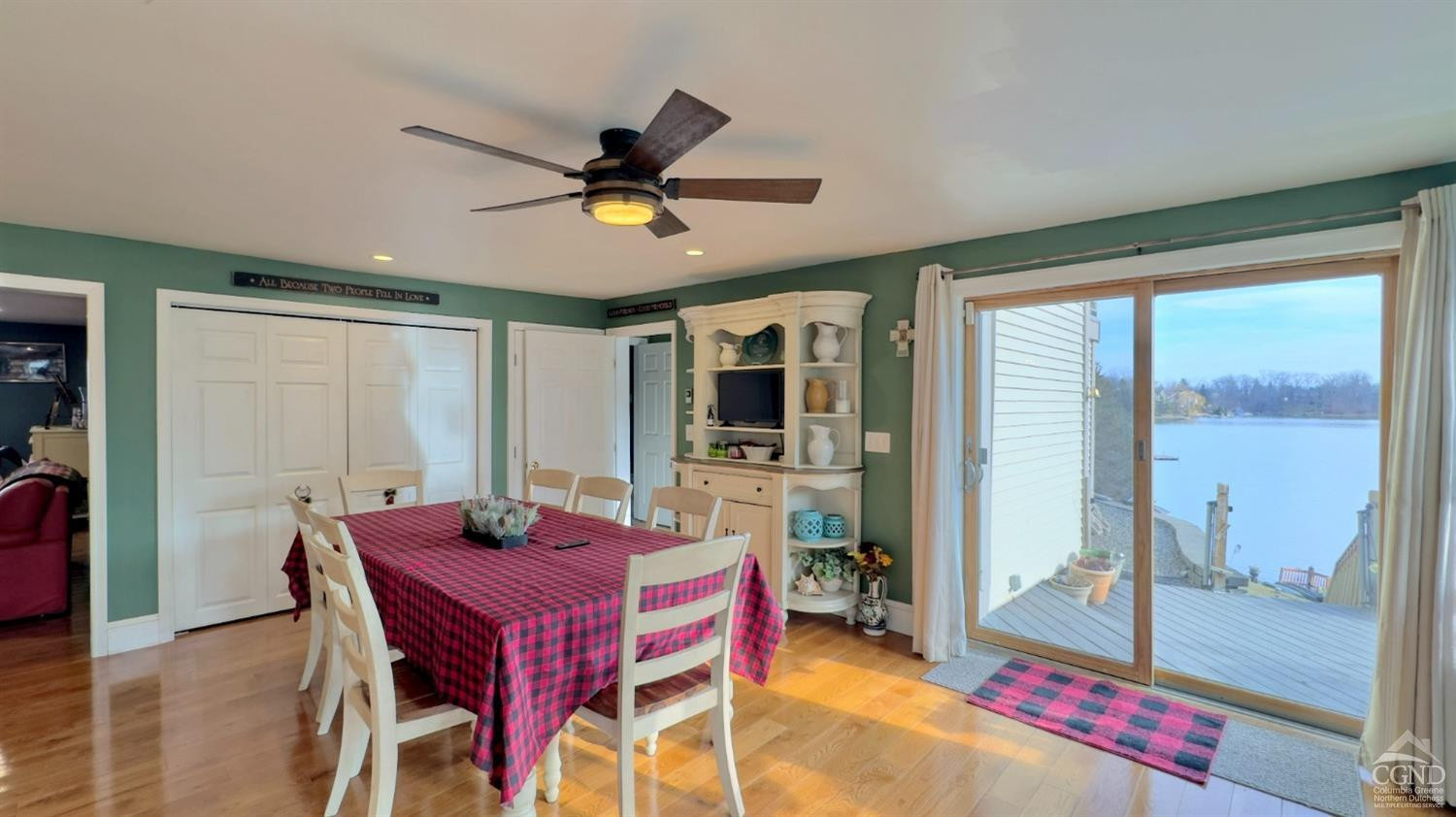 66 Castle Point Road Athens, NY 12015 - Photo 20 of 40 a view of a dining room with furniture window and wooden floor