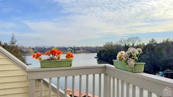 a view of a balcony and a flower pot