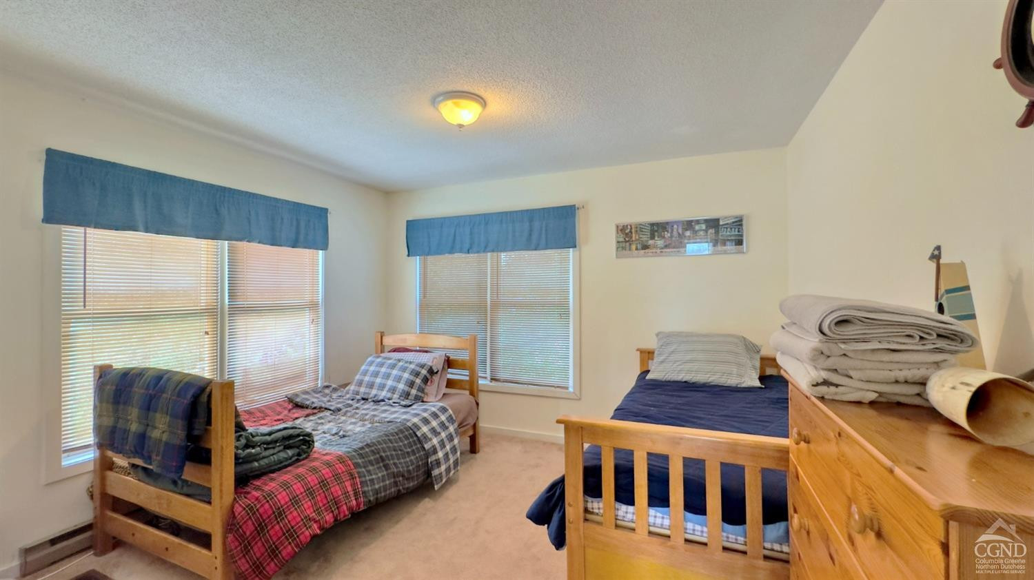 66 Castle Point Road Athens, NY 12015 - Photo 32 of 40 a bedroom with two beds and a window