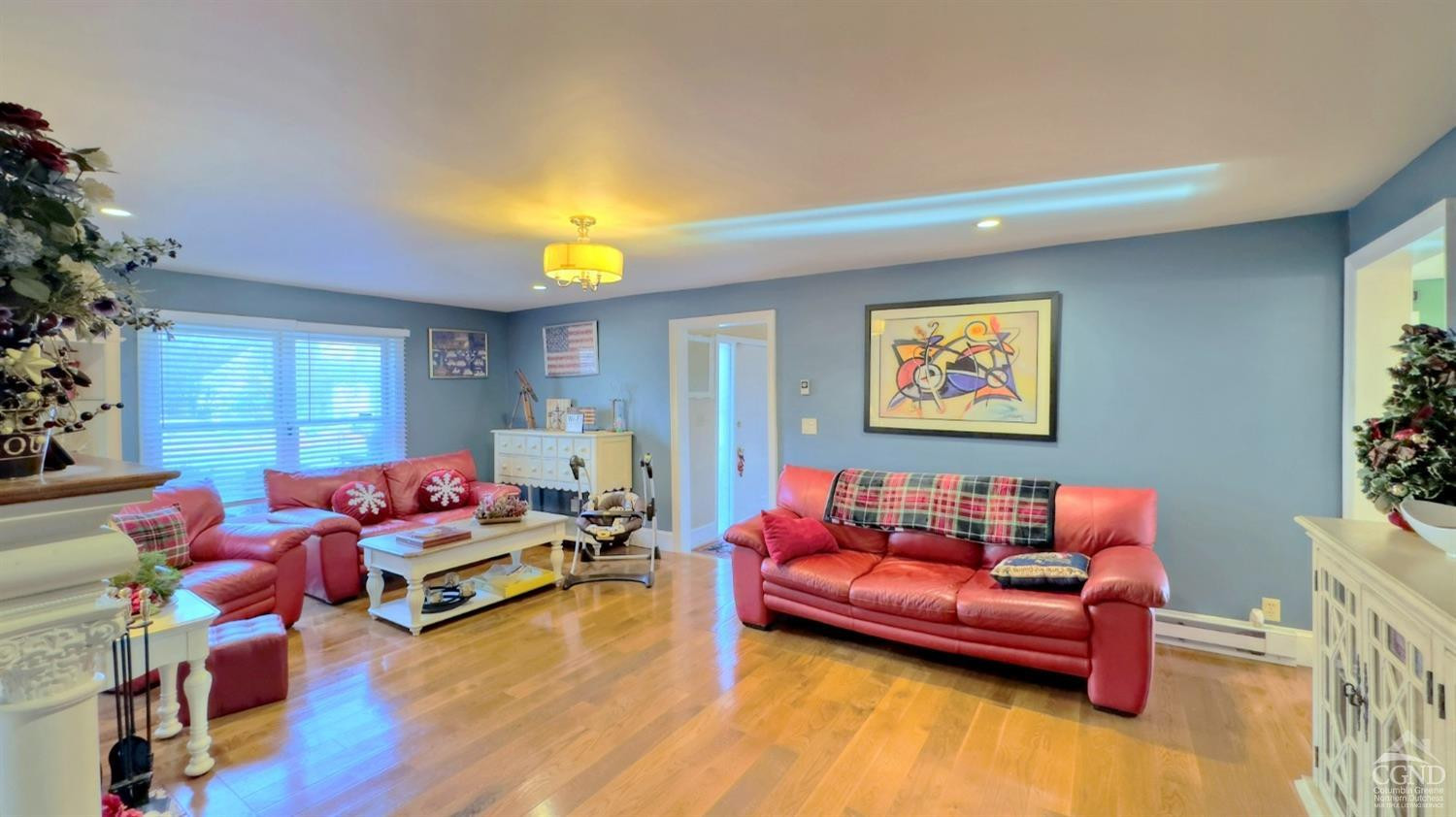 66 Castle Point Road Athens, NY 12015 - Photo 10 of 40 a living room with furniture and a wooden floor