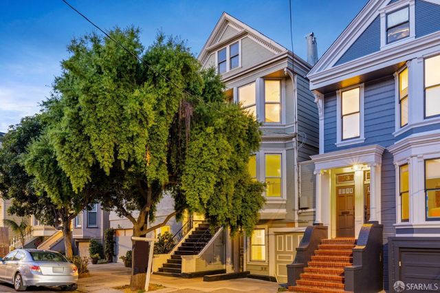 a view of a building with a street