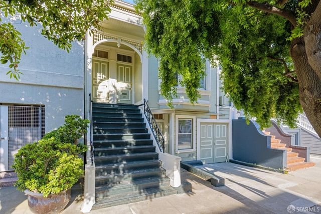 a view of livingroom with hardwood floor and window
