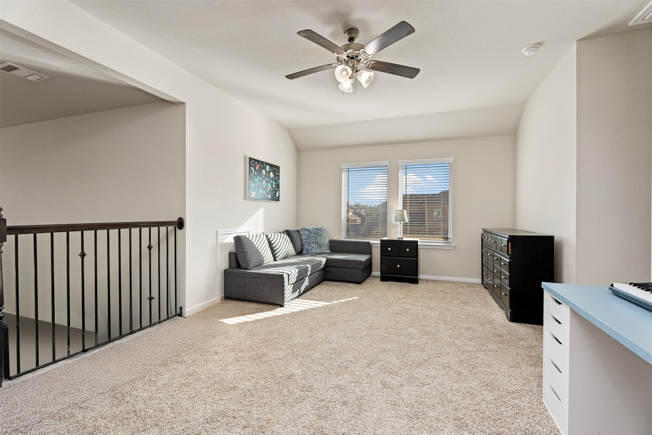 28109 Steepleridge Ct Spring Spring, TX 77386 - Photo 24 of 36 a living room with furniture a large window with outer view