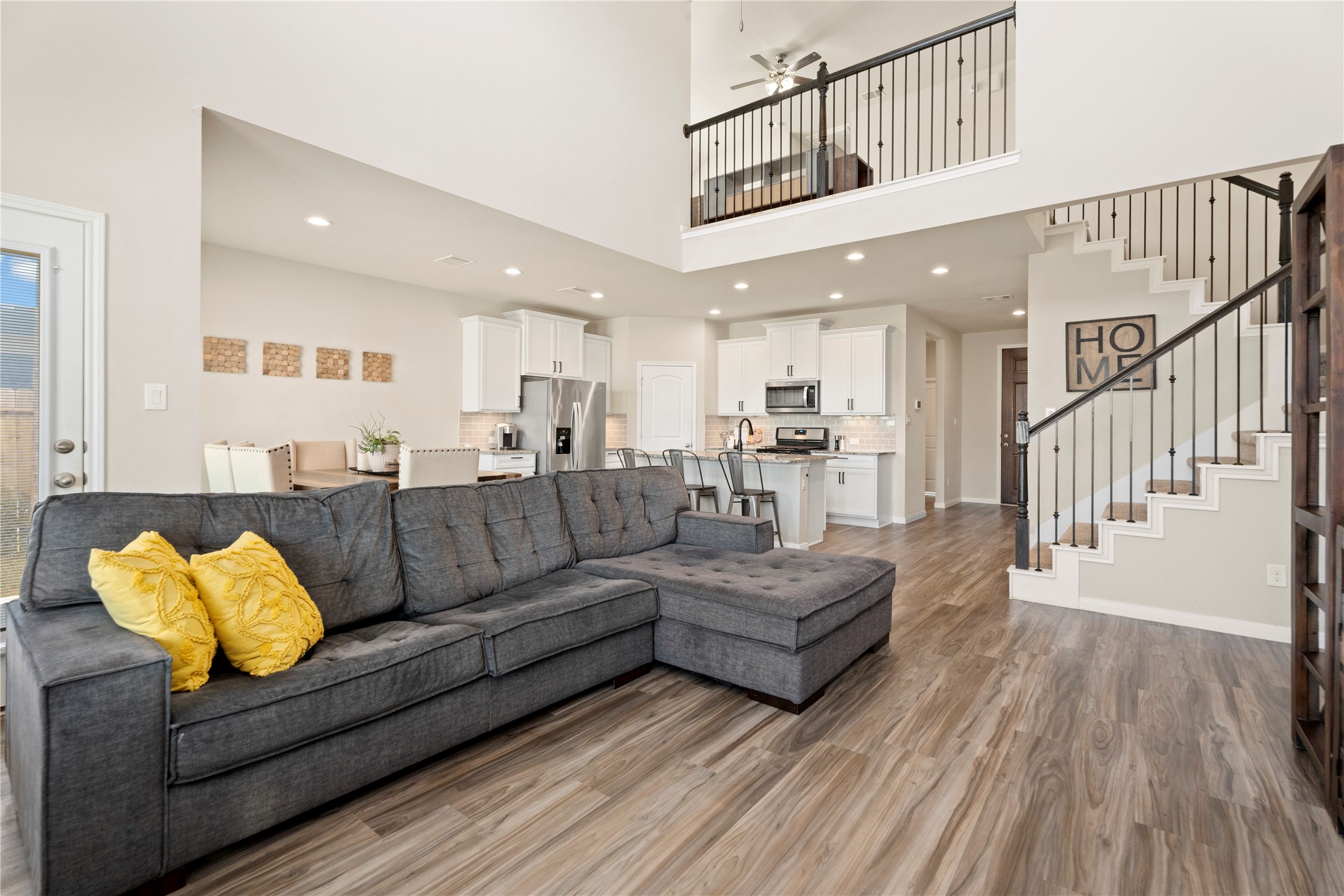 28109 Steepleridge Ct Spring Spring, TX 77386 - Photo 6 of 36 a living room with furniture and wooden floor