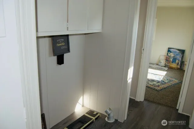 a view of a room with windows