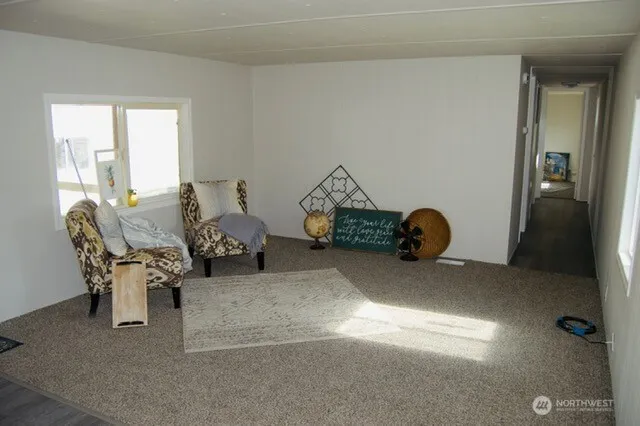 a living room with furniture and a table