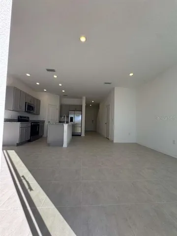 a view of kitchen and kitchen island