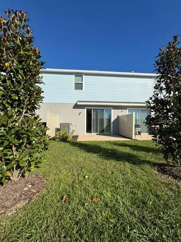 a front view of a house with a garage