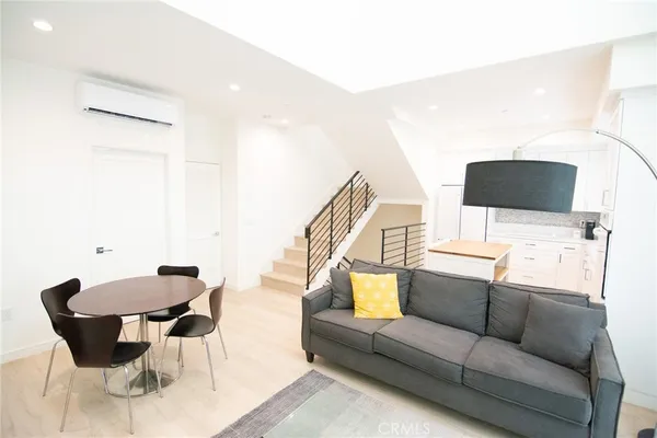 a living room with furniture and a couch