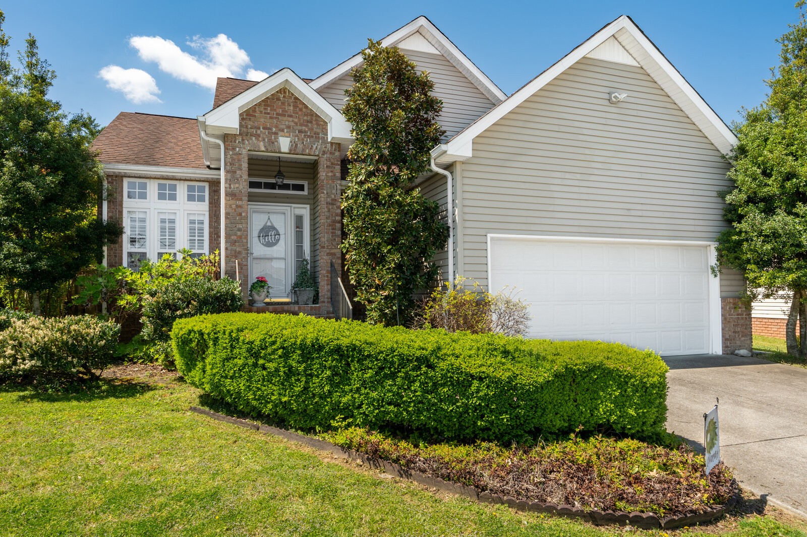 503 Berry Circle Springfield, TN 37172 - Photo 1 of 21 a front view of a house with a garden
