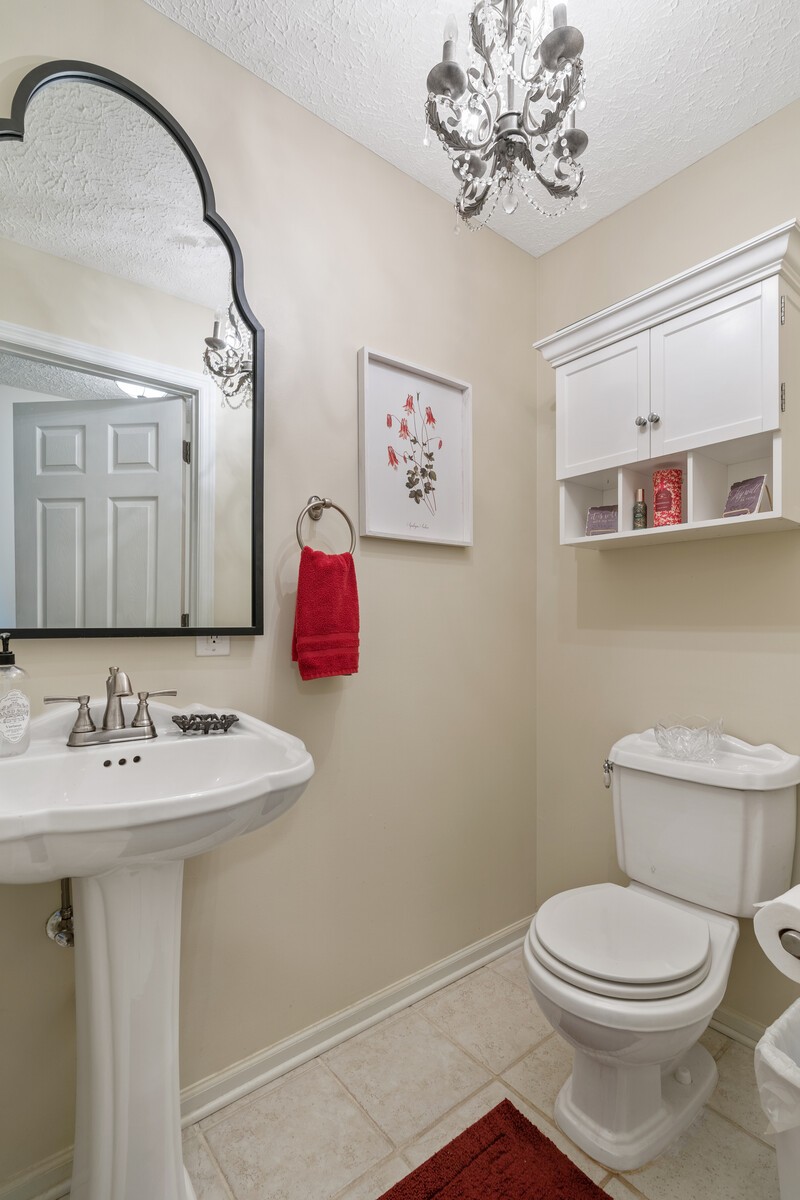 503 Berry Circle Springfield, TN 37172 - Photo 13 of 21 a bathroom with a sink mirror and toilet