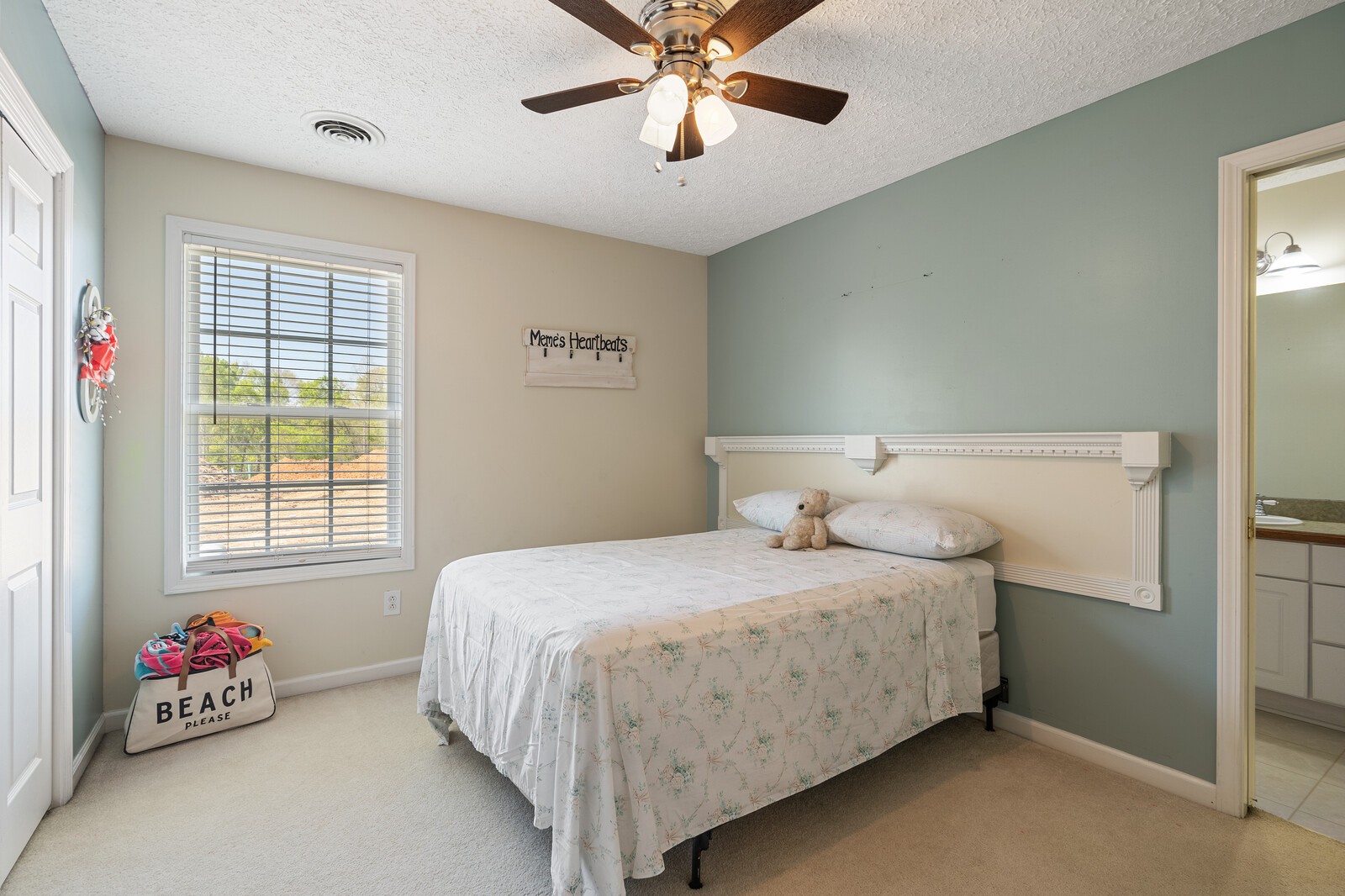 503 Berry Circle Springfield, TN 37172 - Photo 14 of 21 a bedroom with a bed and a chandelier