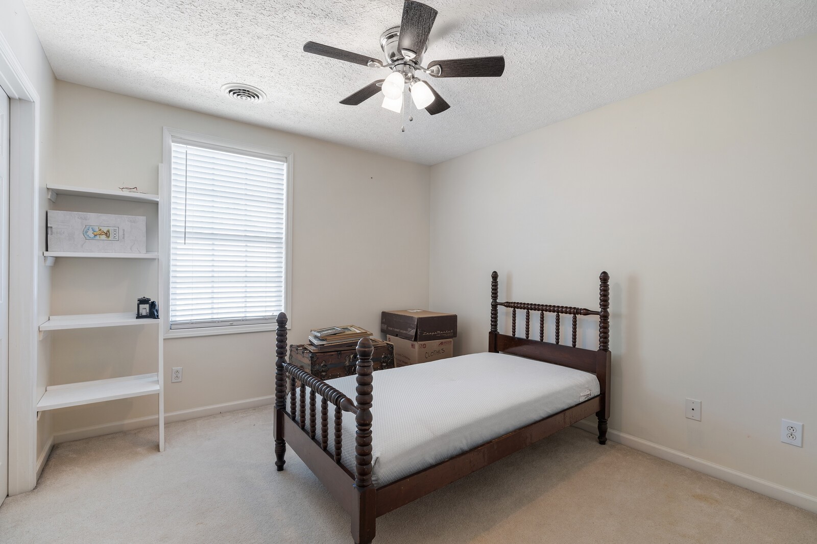 503 Berry Circle Springfield, TN 37172 - Photo 15 of 21 a bedroom with a bed and a chandelier