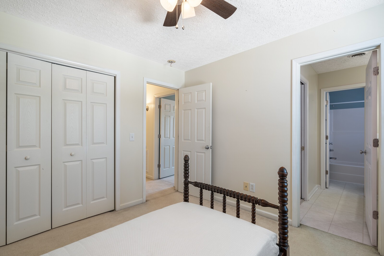 503 Berry Circle Springfield, TN 37172 - Photo 16 of 21 a bedroom with a bed and a chandelier fan
