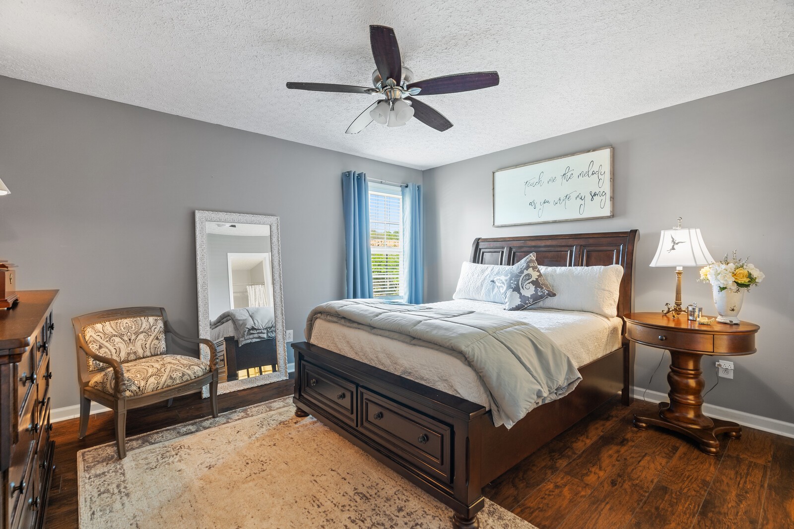 503 Berry Circle Springfield, TN 37172 - Photo 10 of 21 a bedroom with a bed and a chandelier