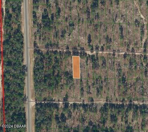 129 West Virginia Street Hawthorne, FL 32640 - Photo 2 of 4 a bird view of a house
