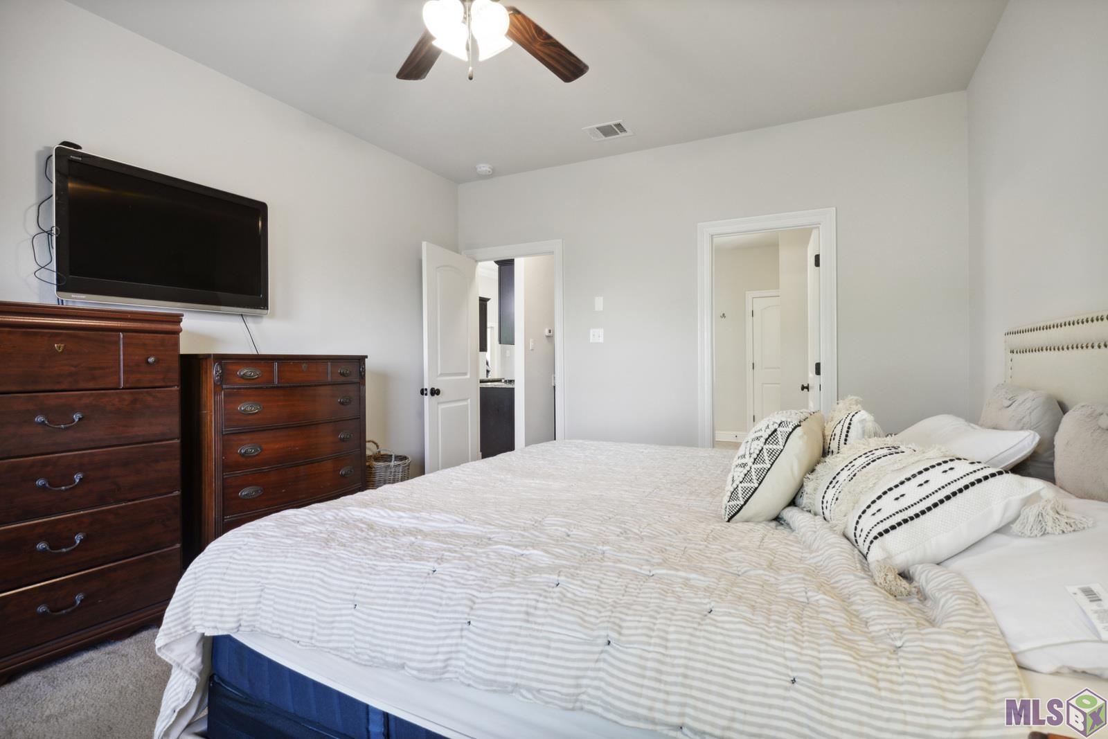 9426 Falling Oak Drive Baton Rouge, LA 70817 - Photo 16 of 25 Primary Bedroom View to Kitchen & Bathroom