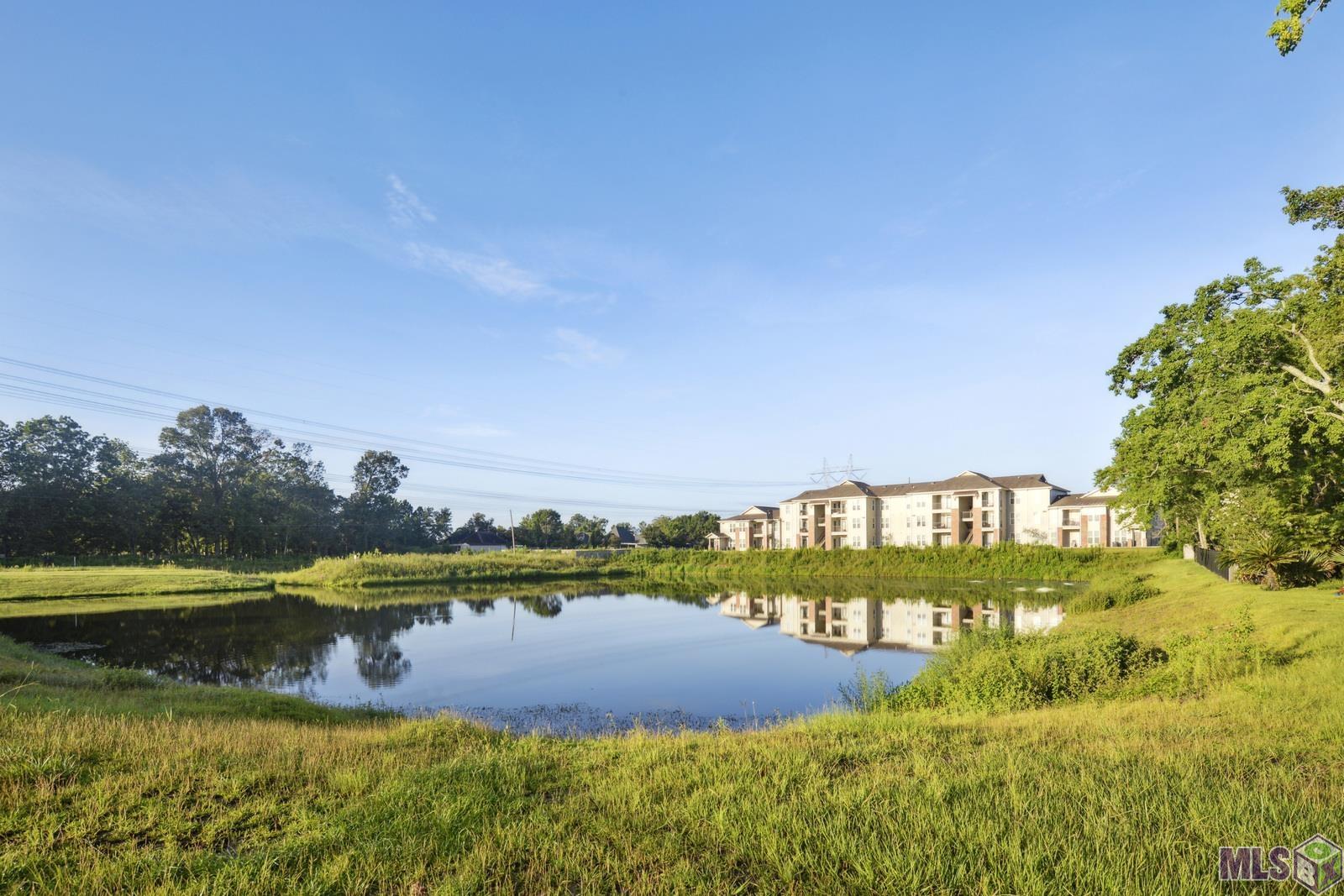 9426 Falling Oak Drive Baton Rouge, LA 70817 - Photo 25 of 25 Great Fishing Pond Behind House!