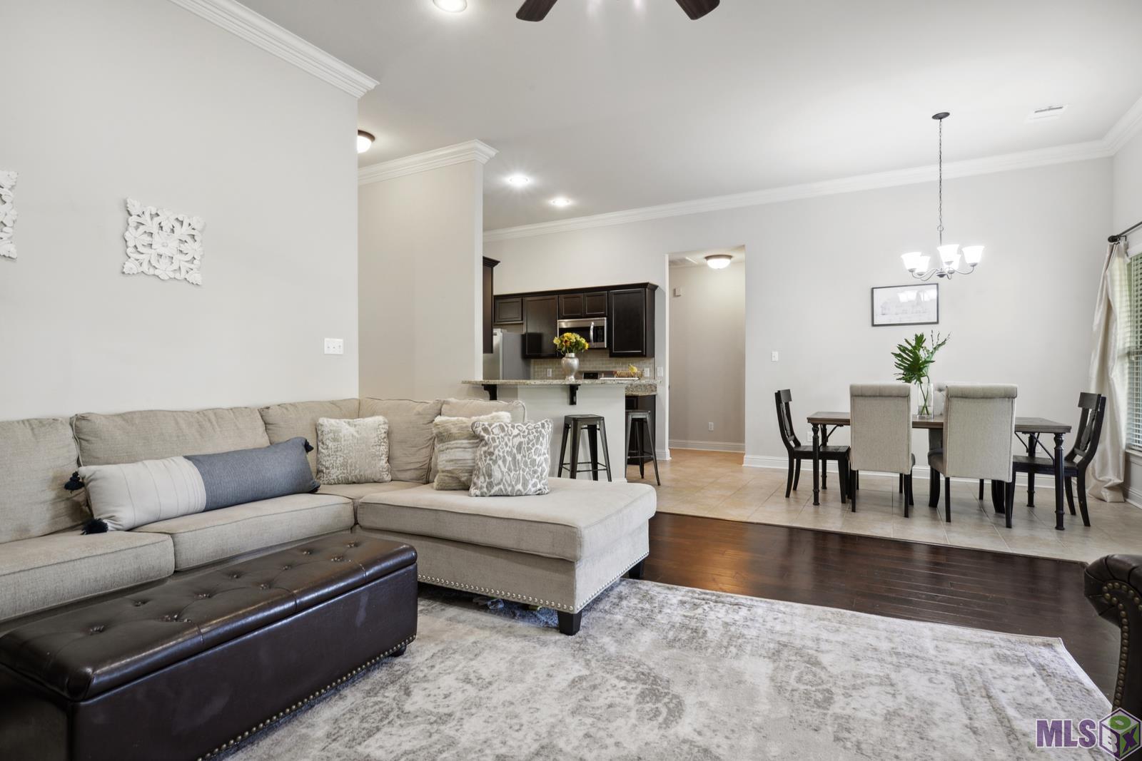 9426 Falling Oak Drive Baton Rouge, LA 70817 - Photo 6 of 25 Living room view to dining and kitchen!