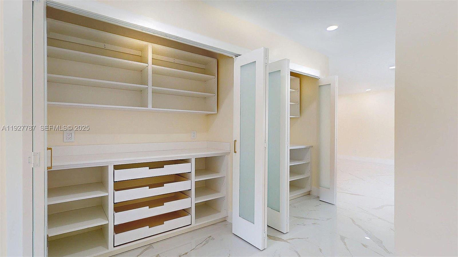 3801 Southwest 132nd Avenue Miami, FL 33175 - Photo 16 of 74 a view of closet area with empty racks