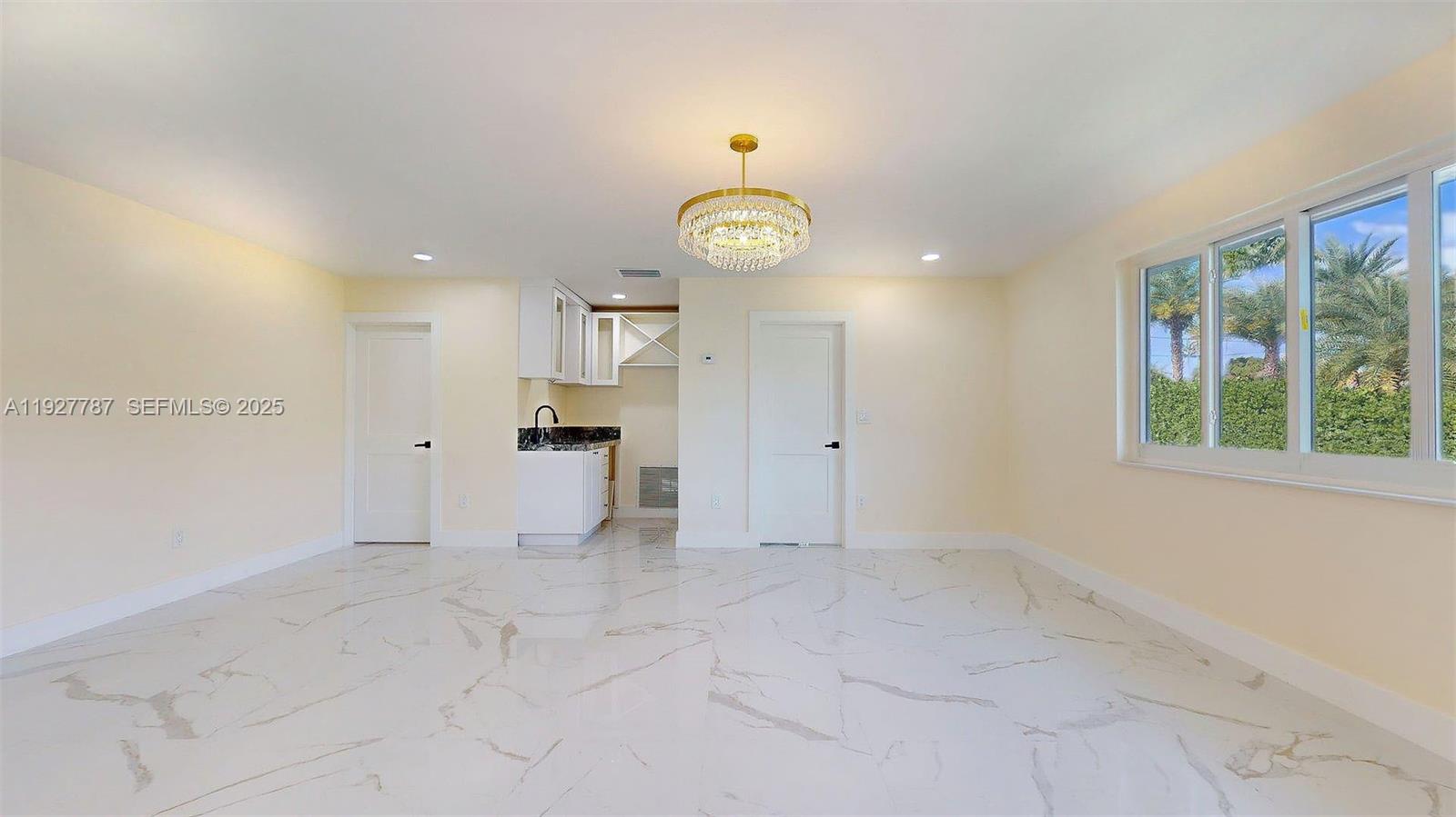 3801 Southwest 132nd Avenue Miami, FL 33175 - Photo 19 of 74 a view of an empty room with a window