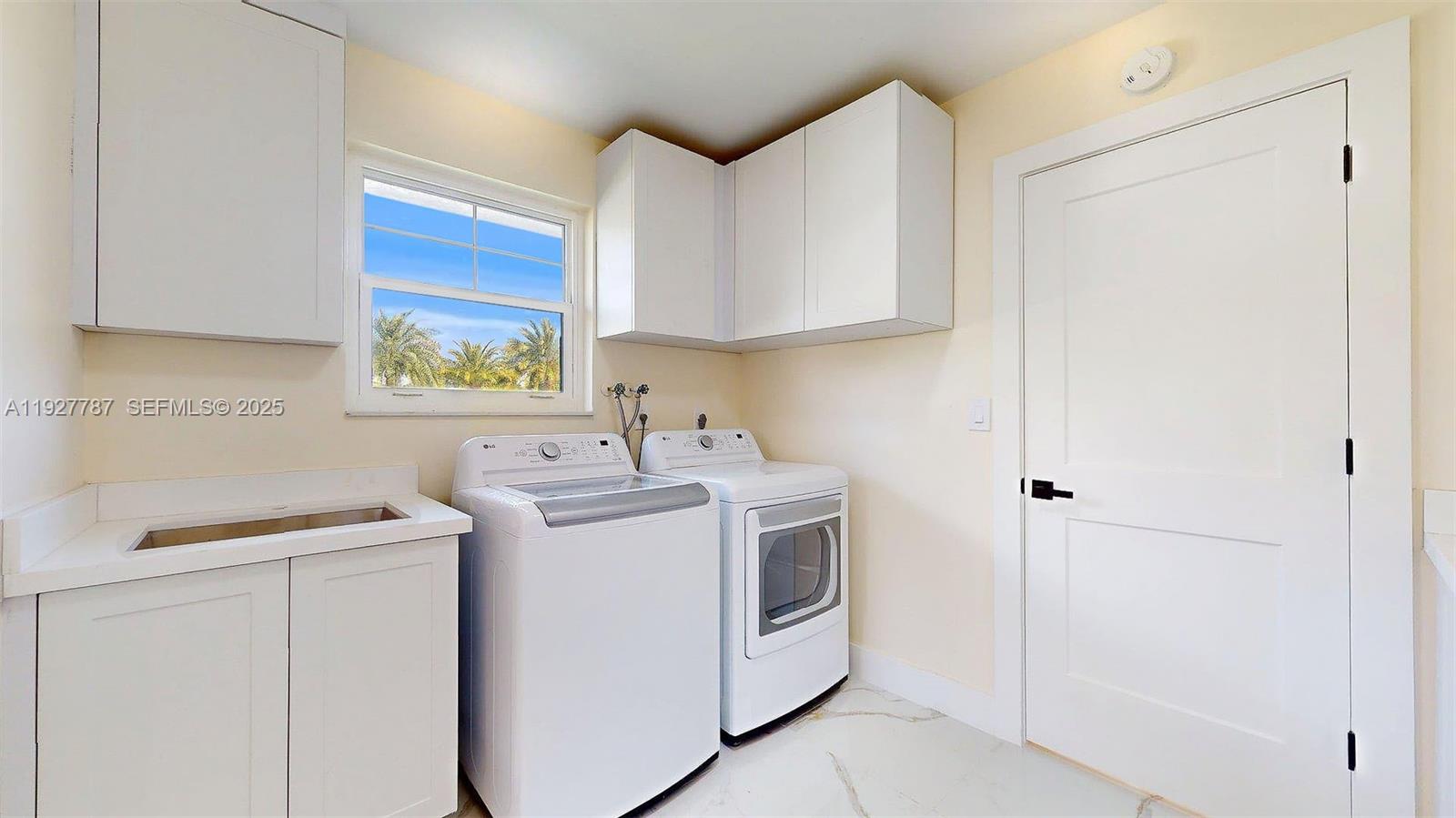 3801 Southwest 132nd Avenue Miami, FL 33175 - Photo 25 of 74 a view of a kitchen with sink and cabinets