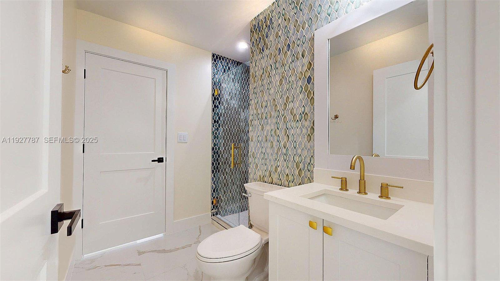 3801 Southwest 132nd Avenue Miami, FL 33175 - Photo 33 of 74 a bathroom with a sink a toilet and shower