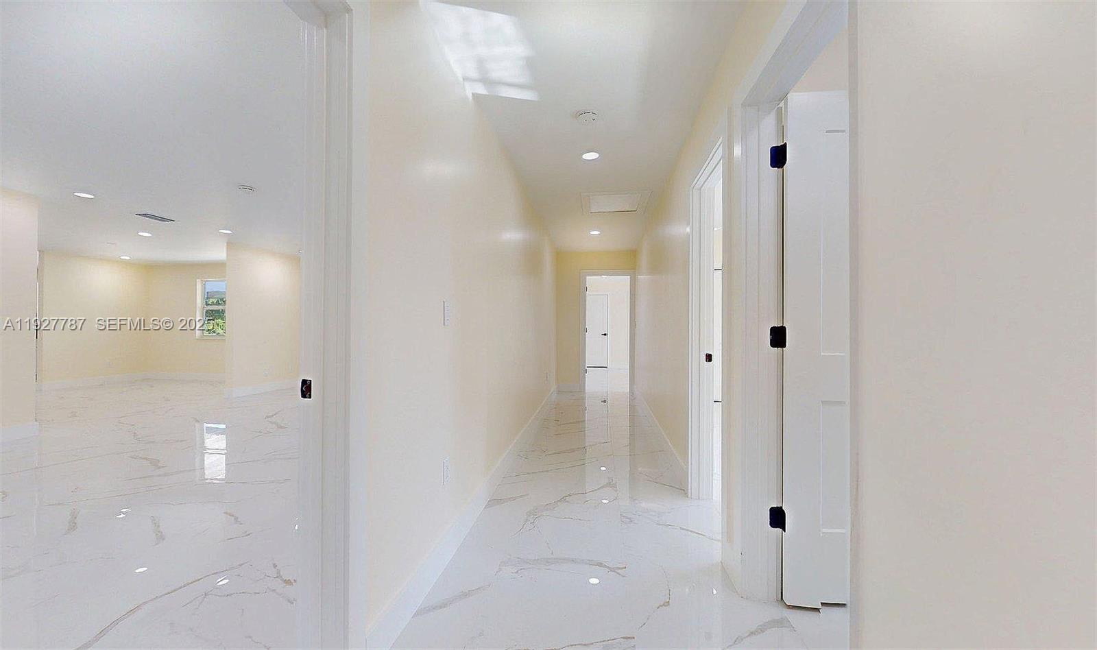 3801 Southwest 132nd Avenue Miami, FL 33175 - Photo 34 of 74 a bathroom with a glass shower door and a sink