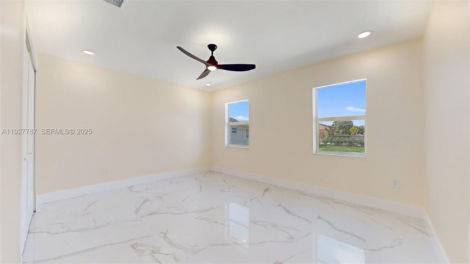 3801 Southwest 132nd Avenue Miami, FL 33175 - Photo 38 of 74 an empty room with windows