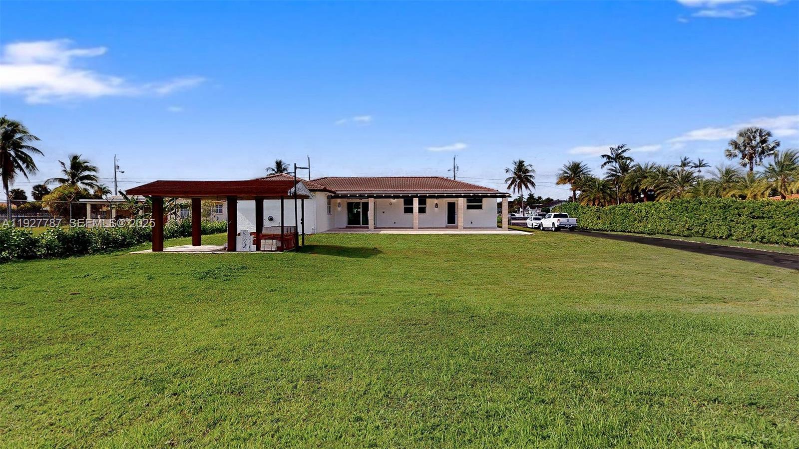 3801 Southwest 132nd Avenue Miami, FL 33175 - Photo 47 of 74 a view of a house with a yard
