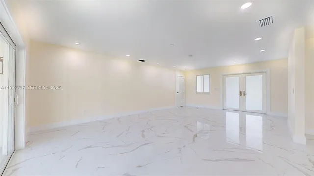 a view of closet area with empty racks