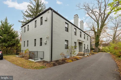 a view of a street with a house