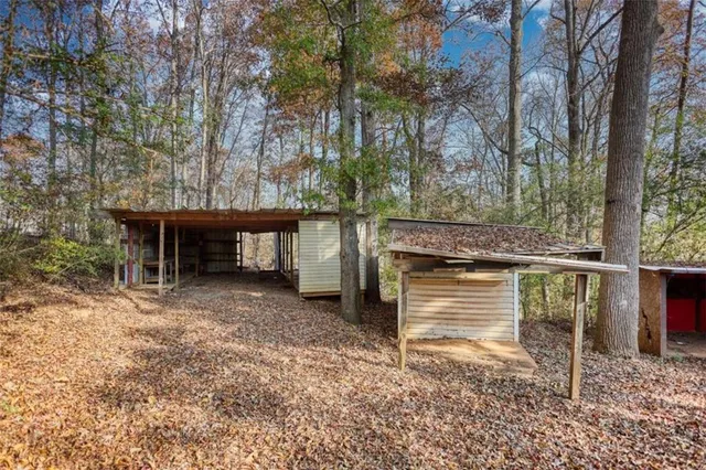 a view of a room with wooden walls