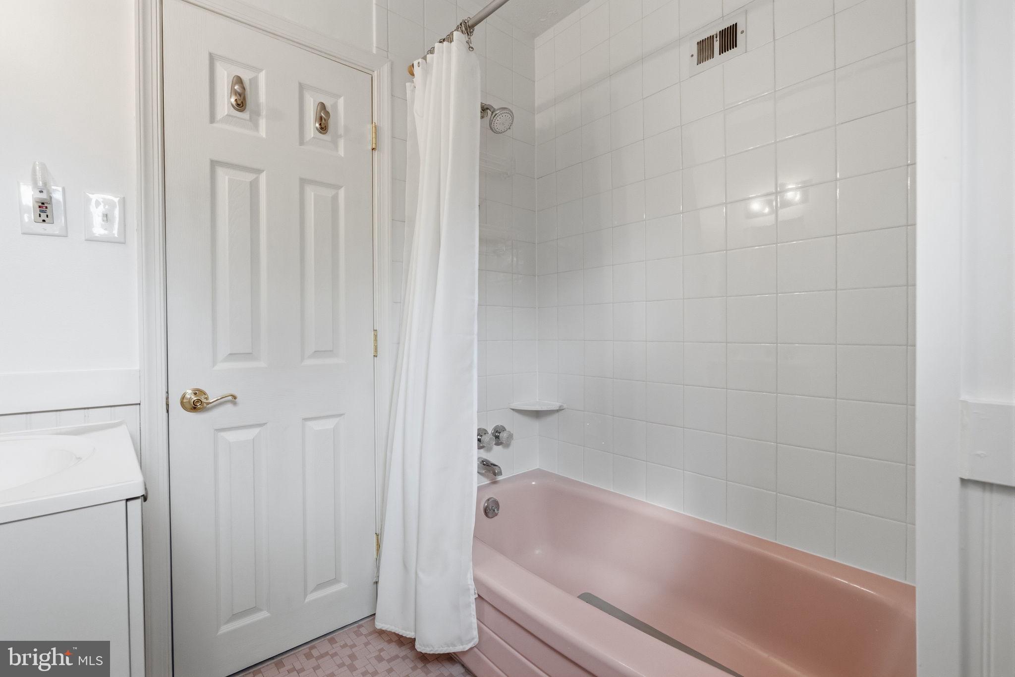 81 Cherokee Road Doylestown, PA 18901 - Photo 24 of 43 a bathroom with a bathtub and a shower