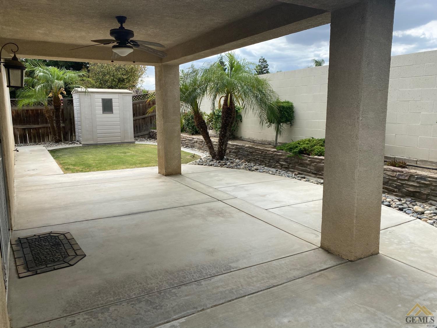 Undisclosed Address Bakersfield, CA 93311 - Photo 7 of 8 a view of a house with backyard and a patio