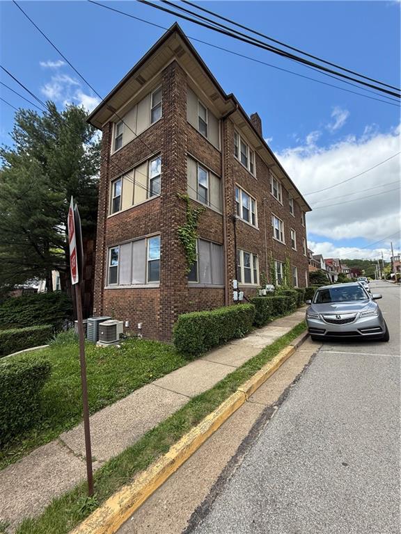 17 Lenox Avenue Pittsburgh, PA 15221 - Photo 3 of 10 a view of a street with a building in the background